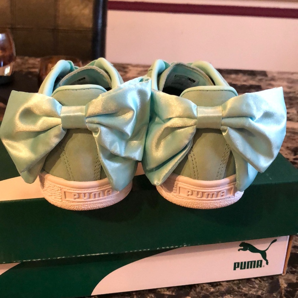 Puma shoes with bow.